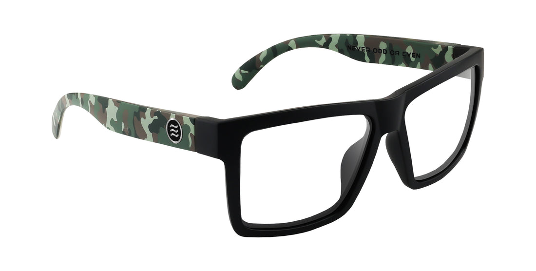 Three-quarter view of Bad Company prescription glasses showcasing matte black square frame, camouflage temples and clear lenses on white background