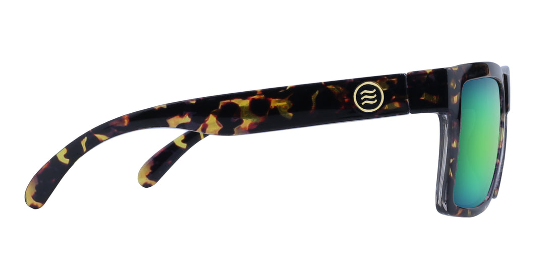 Side view of Jaguar sunglasses showcasing tortoiseshell temple, gold logo, and green mirrored lens on white background
