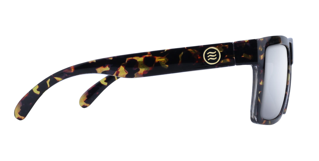Side view of Jaguar sunglasses showing tortoiseshell frame, gold temple logo, and mirrored lens on white background