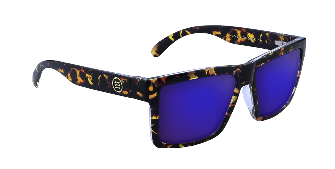 Three-quarter view of Jaguar prescription sunglasses showcasing tortoiseshell gloss frame and purple mirrored lenses with white background