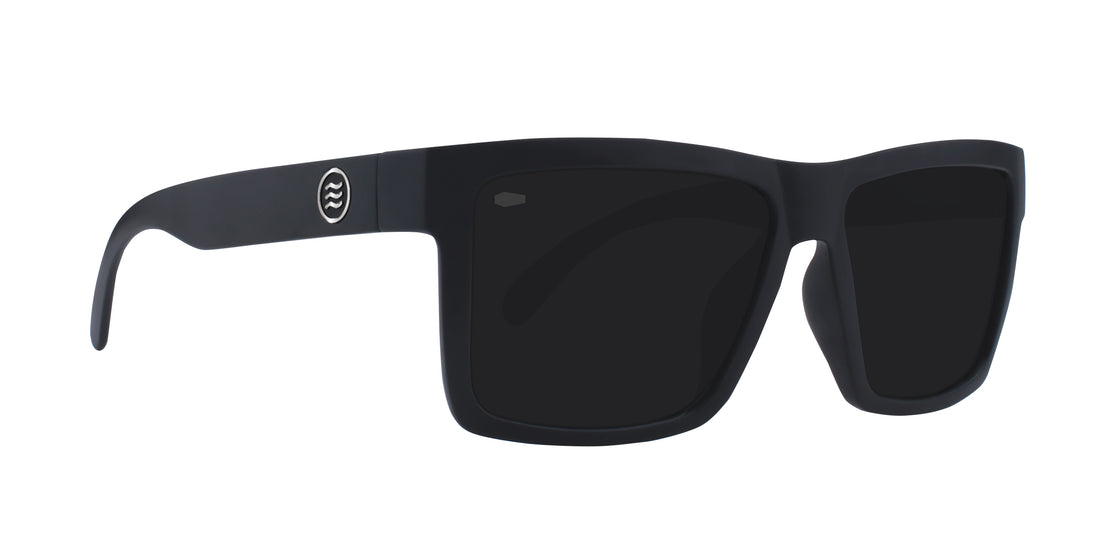 Front three-quarter view of Lowrider Tombstone sunglasses showcasing black frames and dark lenses on a white background
