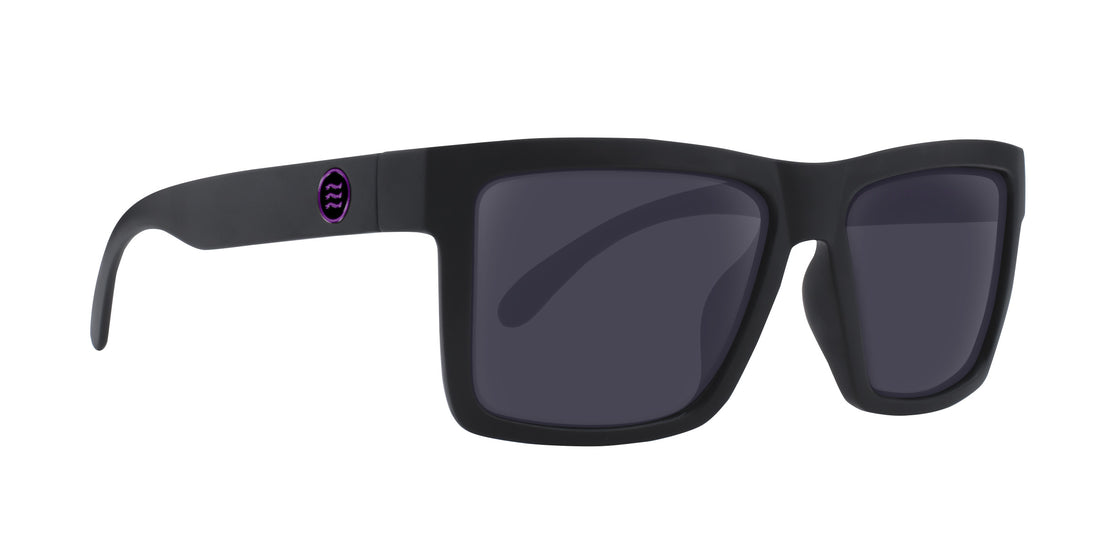 Right close up view of Nightshade prescription sunglasses showing matte black large square frame, dark gray lenses and purple temple logo on white background