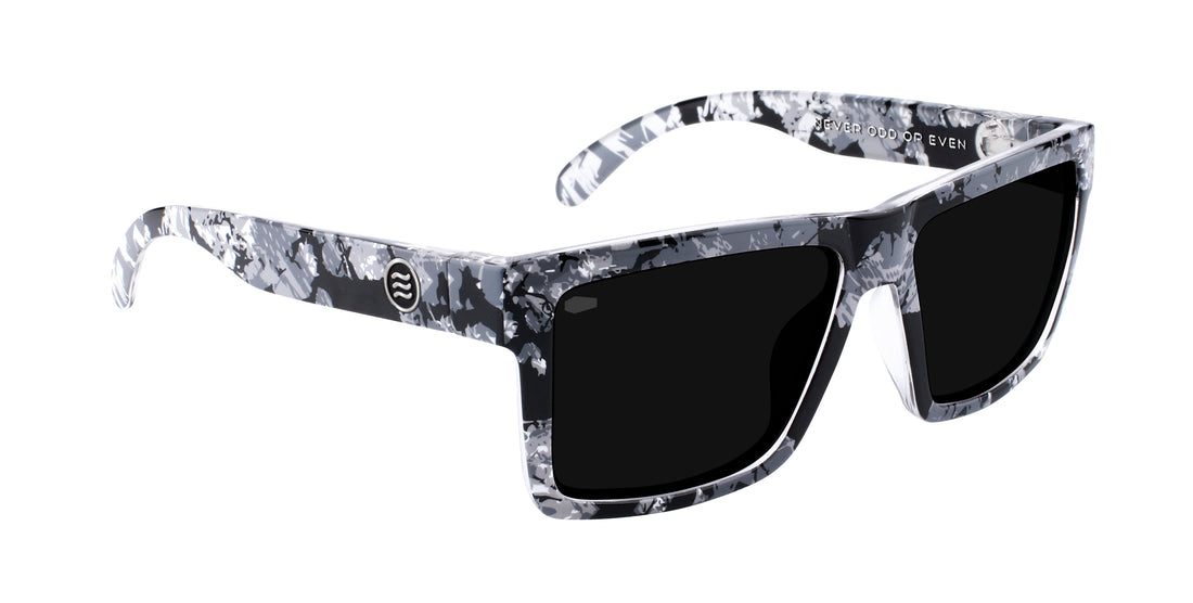 Three-quarter view of South Shore sunglasses showcasing greyscale camo TR90 rectangular frames and polarized lenses on white background