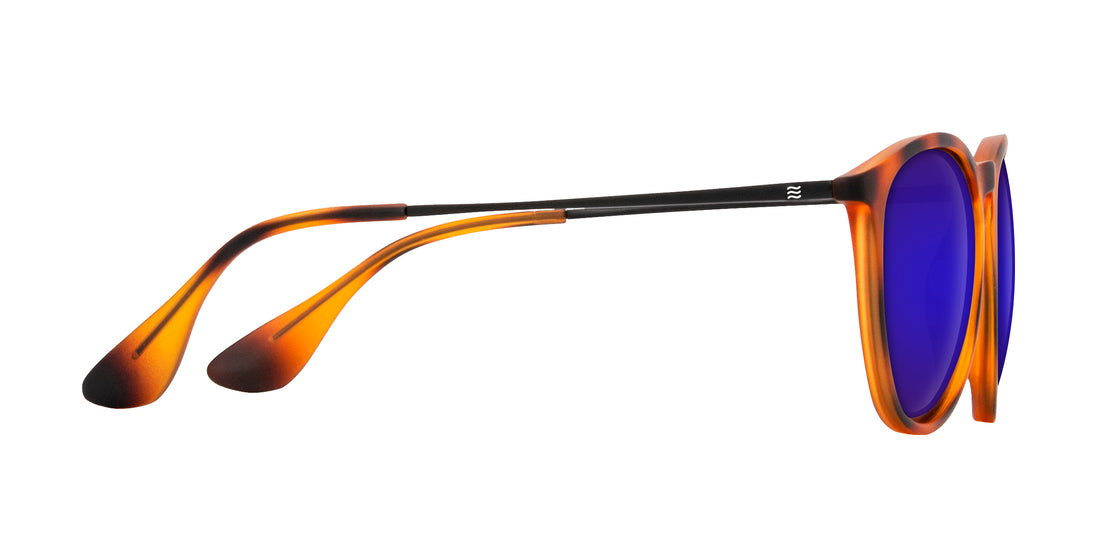 Side view of Bowie prescription sunglasses showcasing tortoise frame and purple mirrored lenses on white background