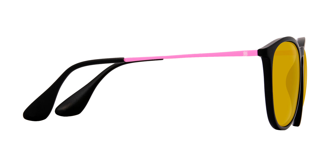 Side view of Quinn sunglasses showcasing pink stainless-steel temple, black TR90 frame and yellow lenses on white background