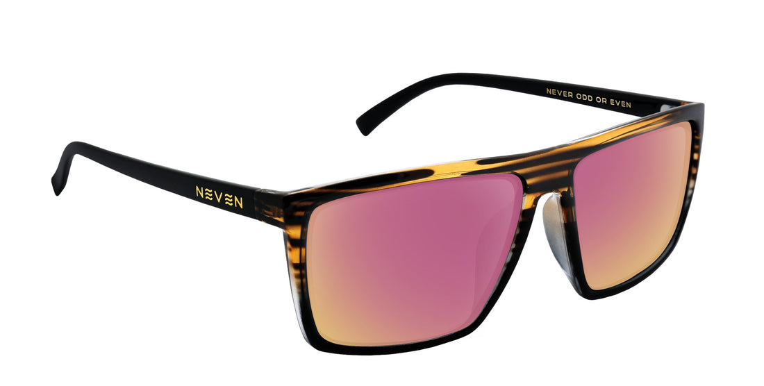 Three-quarter view of Asbury prescription sunglasses showcasing rose-pink lenses and a gloss black-and-wood frame on white