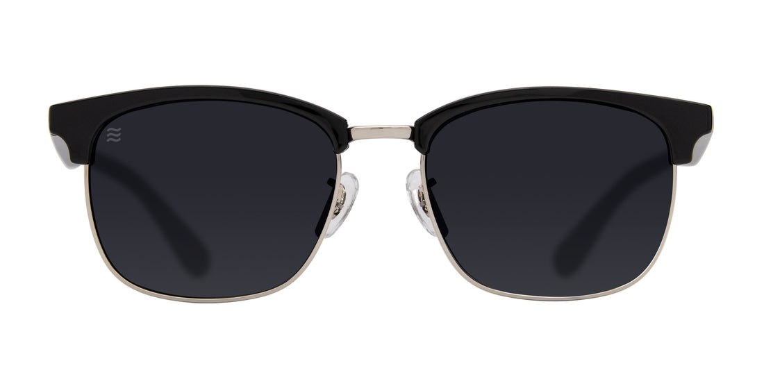 Bullet black semi-rimless polarized sunglasses with dark lenses.