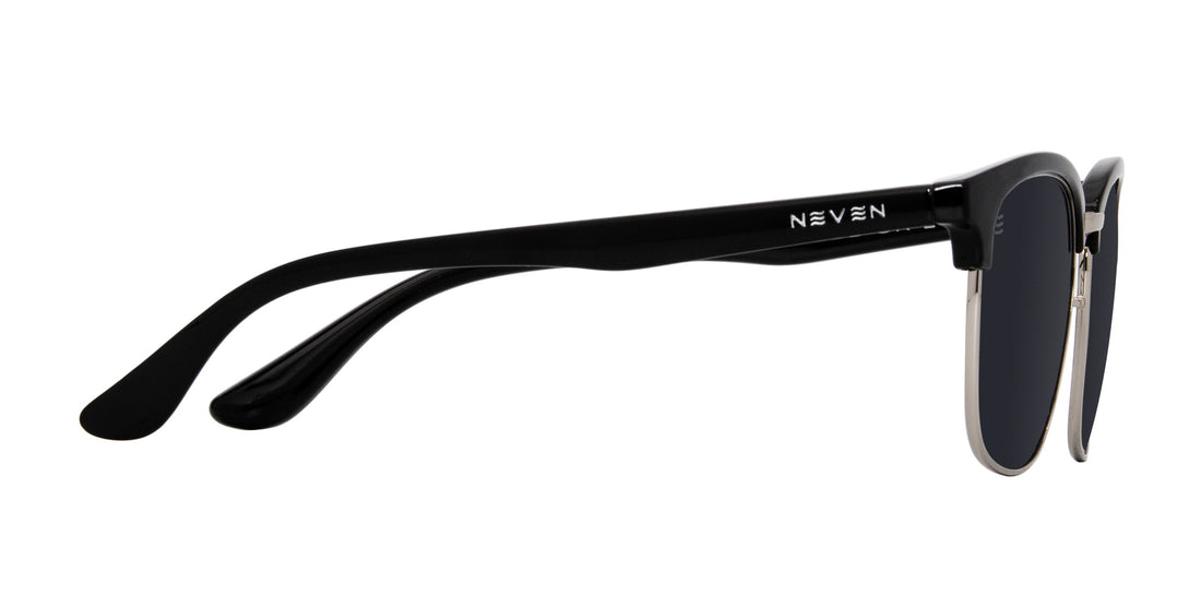 Side close-up of Bullet sunglasses showcasing black TR90 temples with Neven logo, semi-rimless silver frame and polarized black lenses on white background