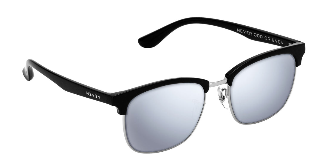 Angled view of Bullet Prescription sunglasses showing black browline top, silver metal rims, adjustable nose pads and mirrored lenses on white background