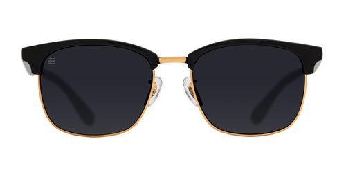 Front view of black and gold sunglasses with dark lenses.