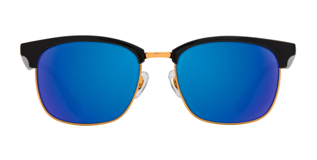 Front view of Gold Rush prescription sunglasses showcasing black browline frames, gold rims, and blue lenses on white