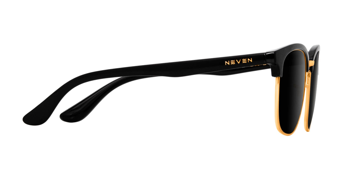 Side close up of Gold Rush prescription sunglasses showing black TR90 temple, gold trim and NEVEN logo on white background