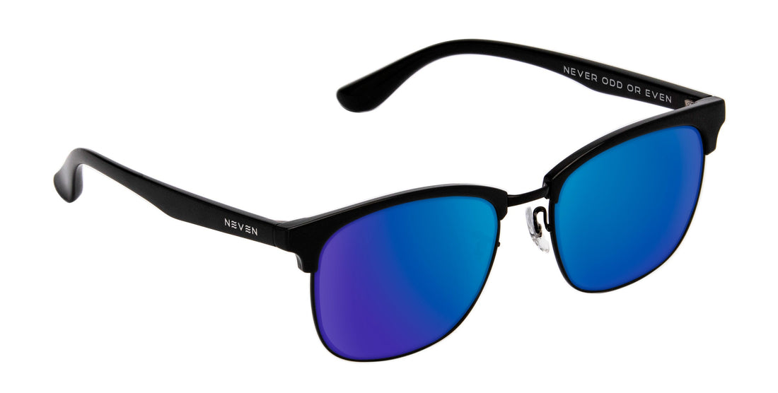 Three-quarter view of Stealth prescription sunglasses showing black TR90 frame and blue mirrored lenses on white background