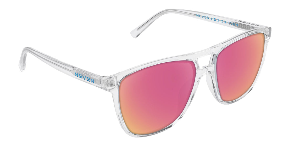 Three-quarter view of Lucid prescription sunglasses with clear frame, rose-pink mirrored lenses, and Neven logo on white background