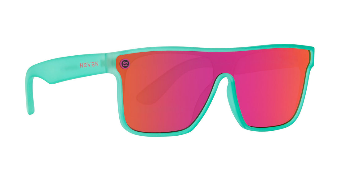 Front view of Bliss polarized sunglasses showcasing teal frame and pink mirrored lenses on white background