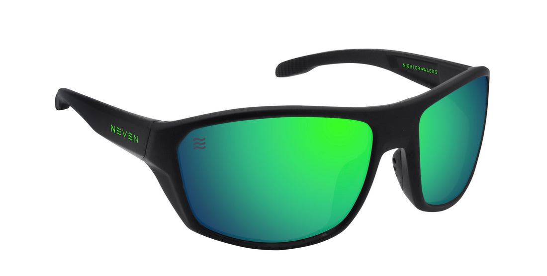 Angled close-up of P Steele sunglasses showing matte black frame, polarized green lenses and green logo on white background