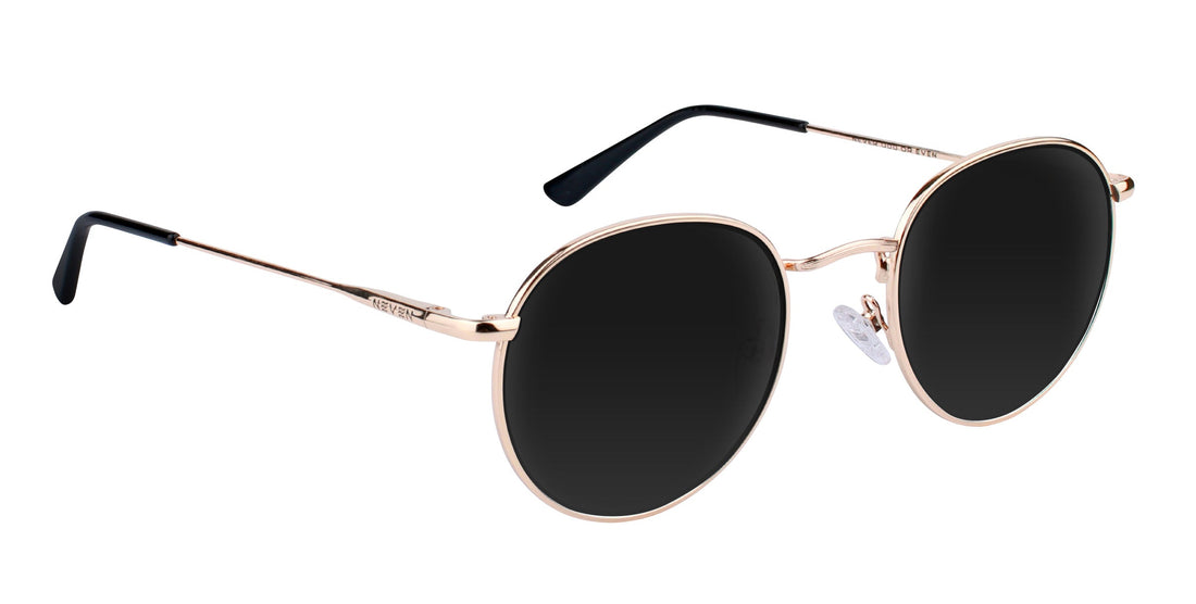 Three-quarter close-up of Rae prescription sunglasses showcasing gold metal aviator frame and black lenses on white background