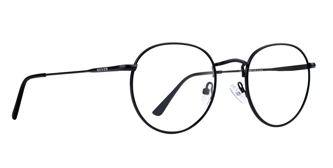 Close-up side view of Saint prescription sunglasses showing thin round black metal frames and adjustable nose pads on white background