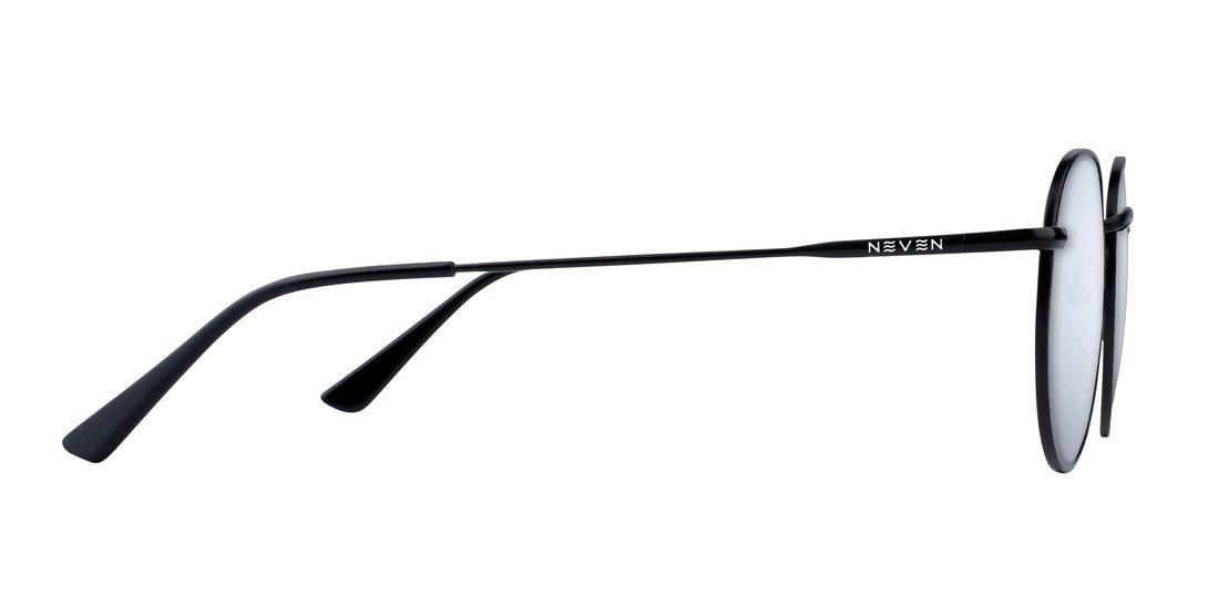 Side view of Saint Rx aviator sunglasses showcasing thin black metal temples with NEVEN logo and prescription lenses on white background