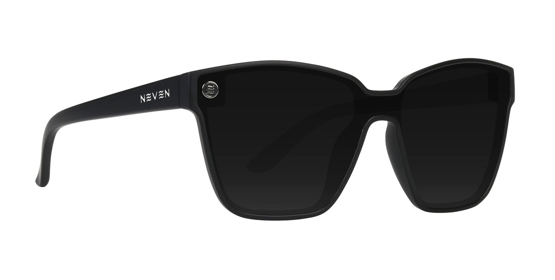 Close-up front three-quarter view of Everlast Domestic cat-eye sunglasses showcasing black frame and dark polarized lenses on white background