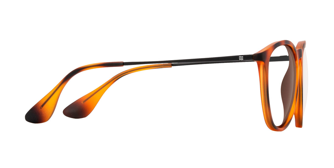 Side view of Bowie prescription glasses showing tortoise TR90 frame, slim black metal temples and clear lenses on white background